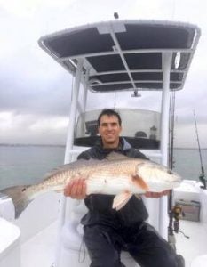 Andrew McMains holding large fish